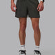Man wearing Pace 5" Lined Performance Shorts - Pirate Black