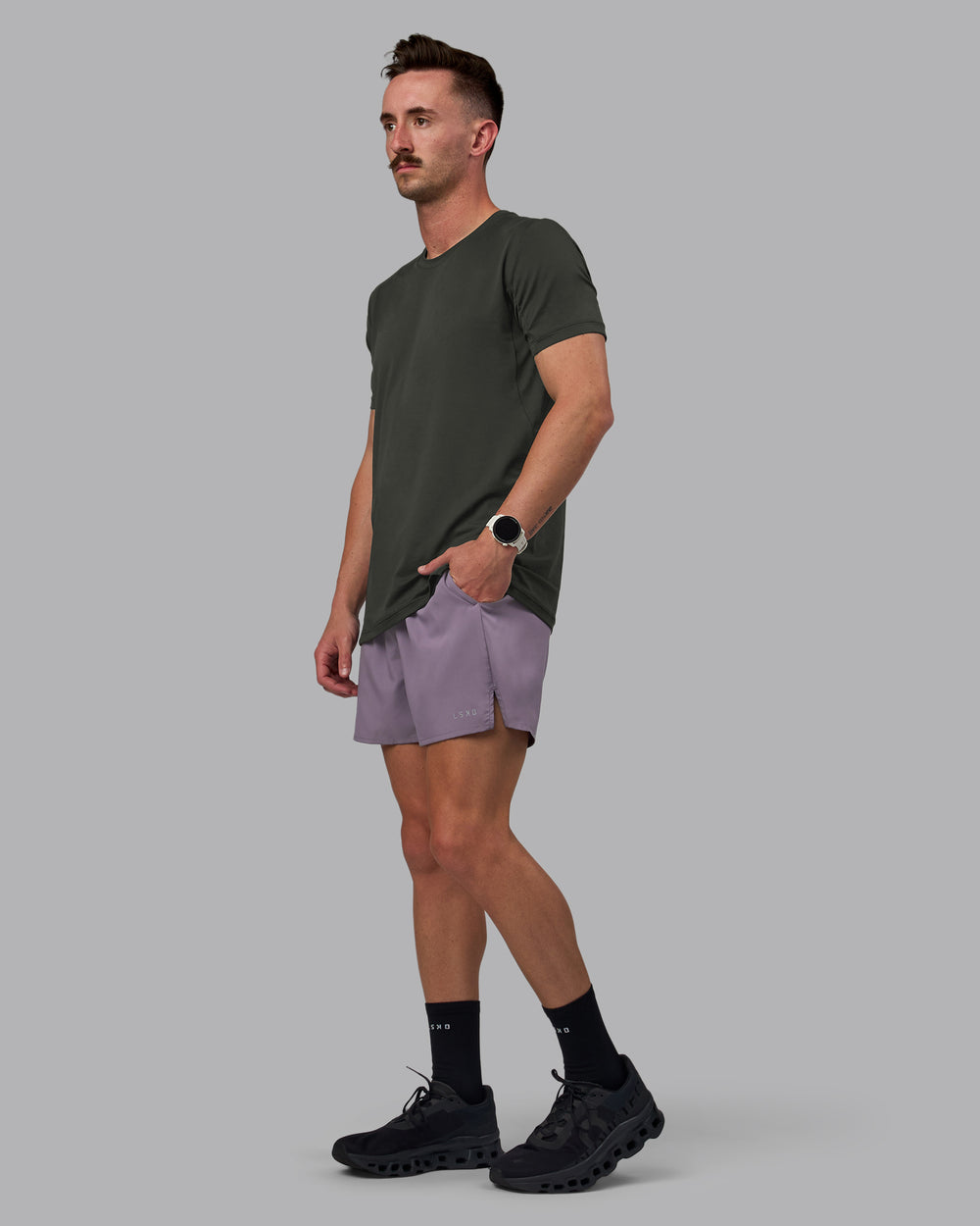 Man wearing Pace 5" Lined Performance Shorts - Purple Sage