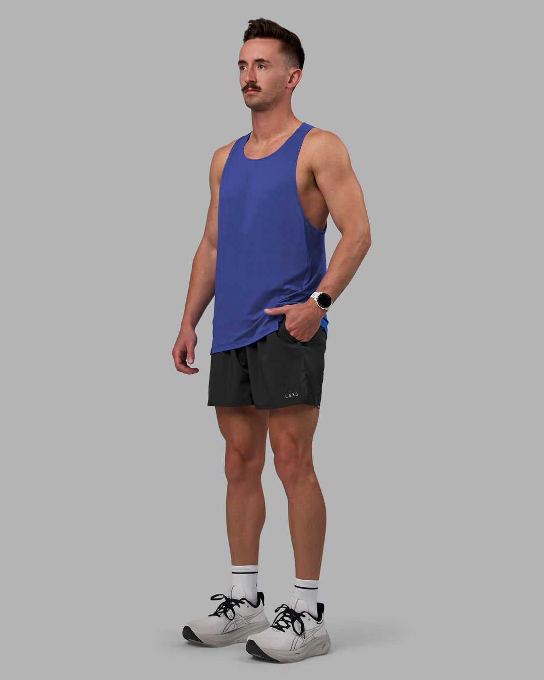 Man wearing Pace Running Tank - Power Cobalt