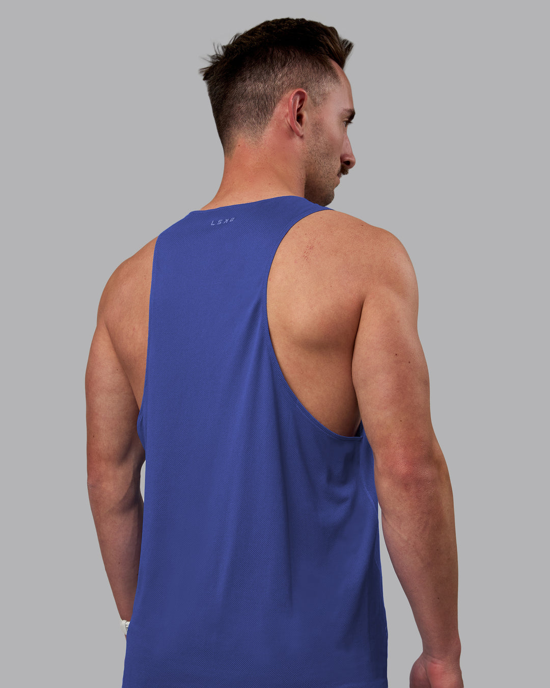 Man wearing Pace Running Tank - Power Cobalt