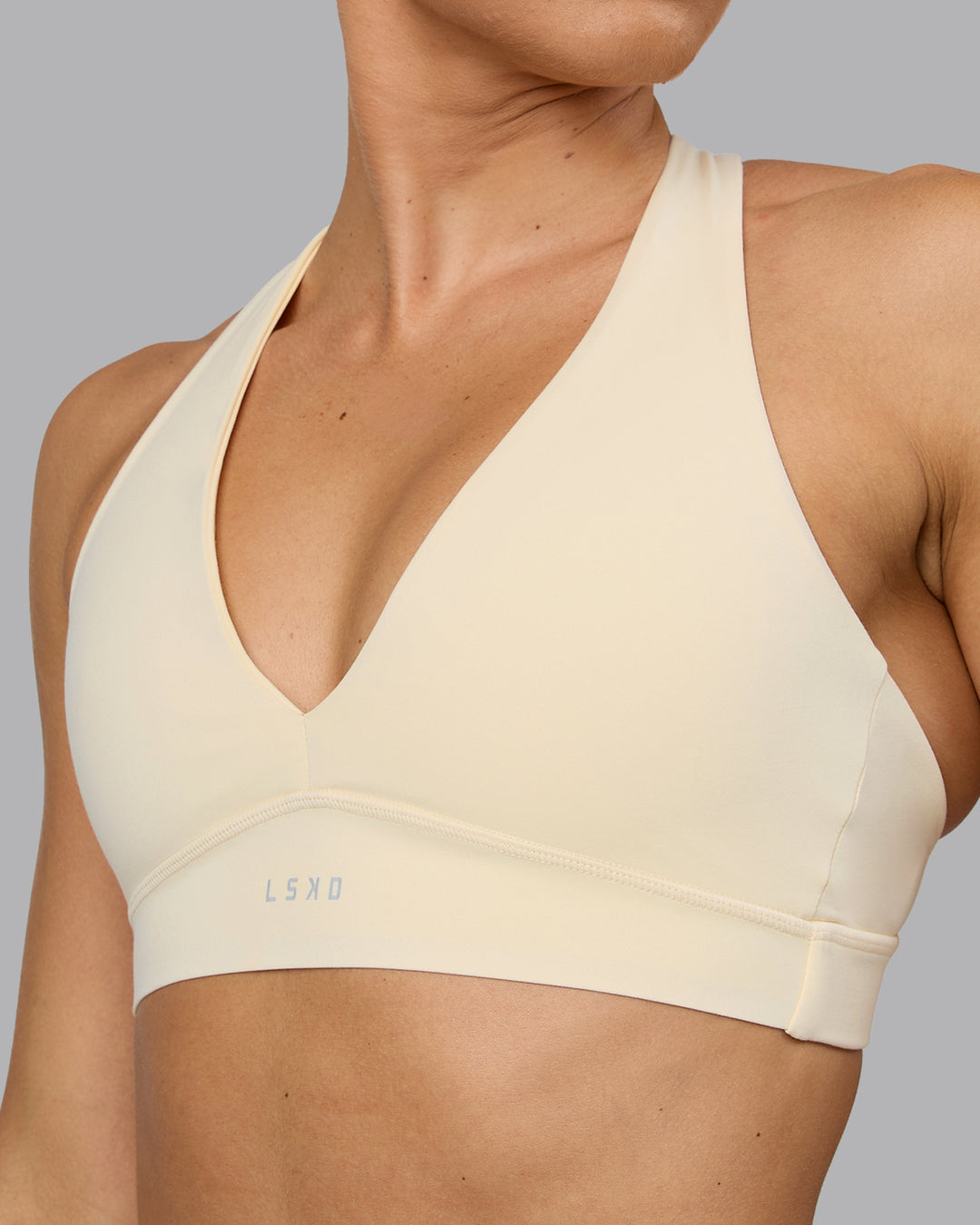 Woman wearing Poise Sports Bra - Ivory