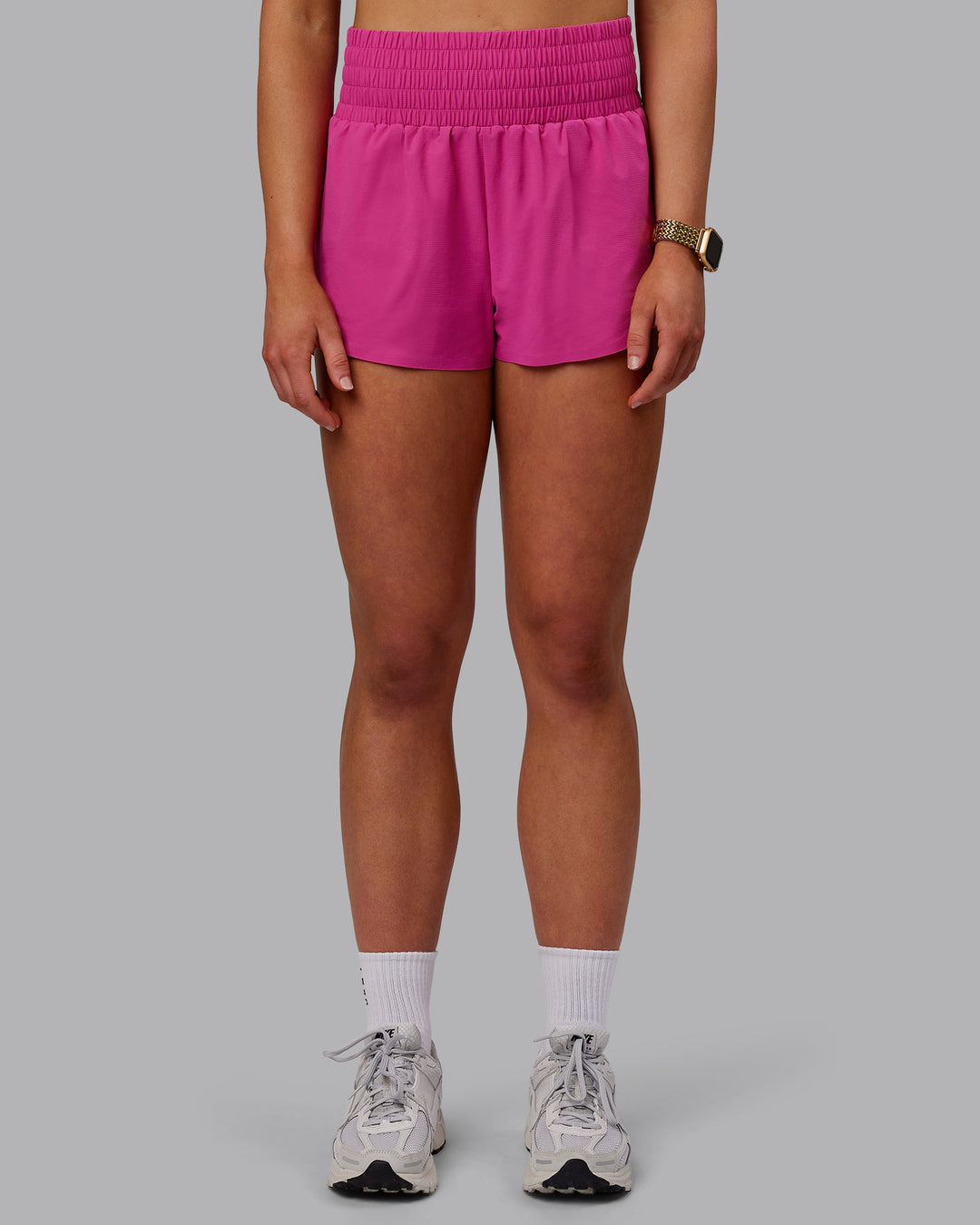 Woman wearing Power Train Shorts - Fuchsia Pink