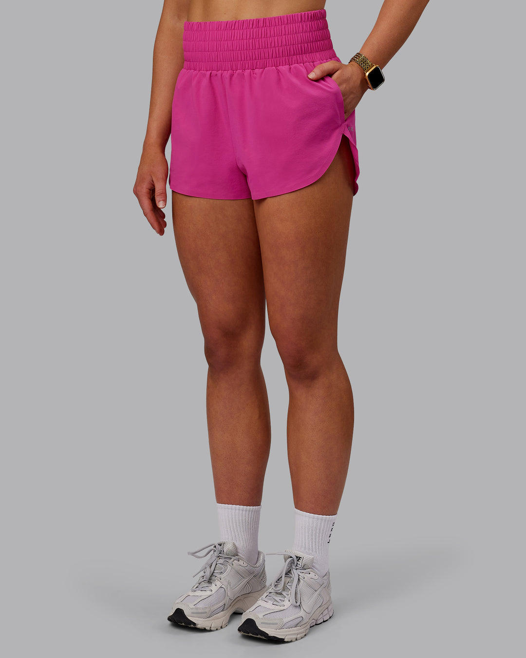 Woman wearing Power Train Shorts - Fuchsia Pink