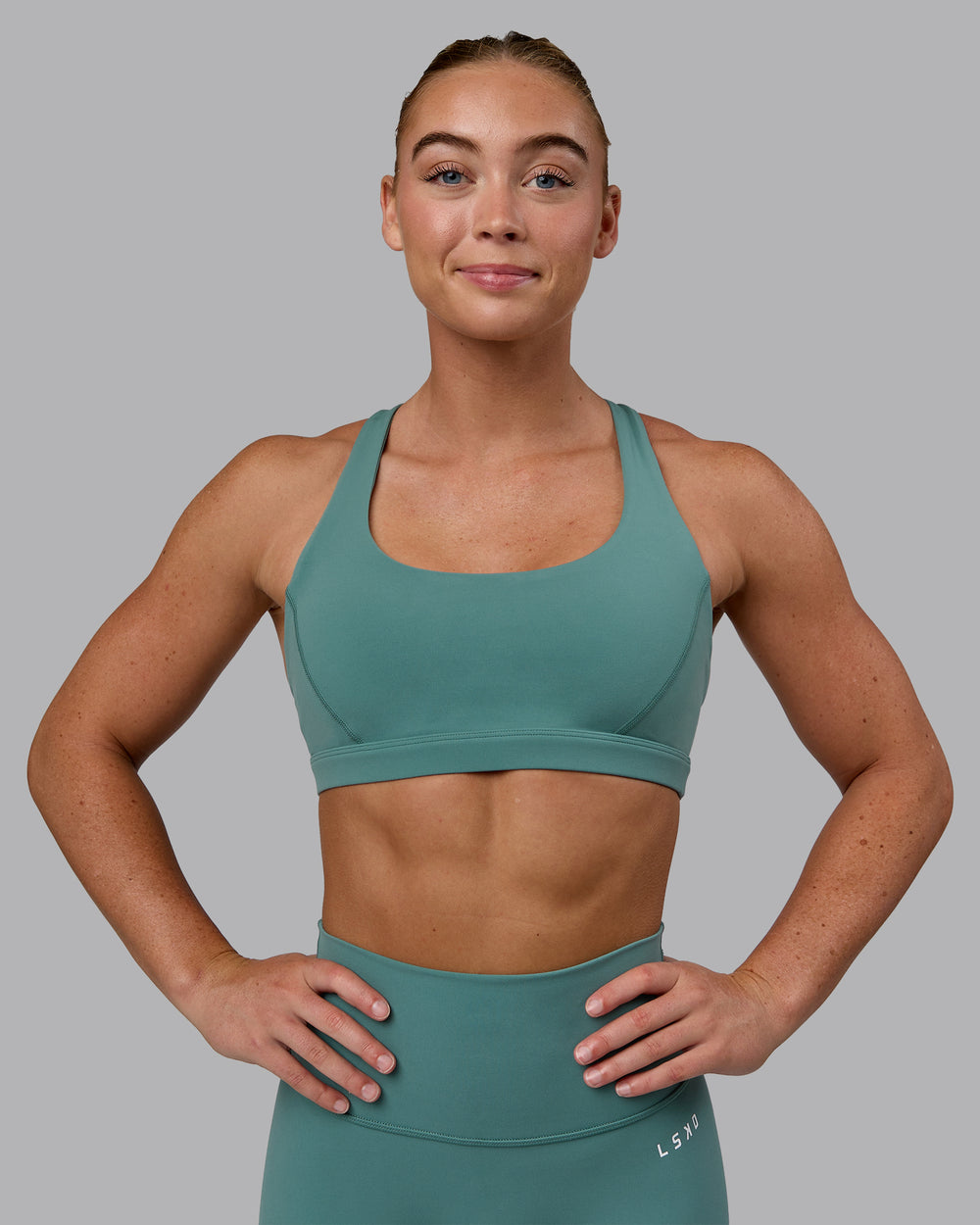 Woman wearing Precision Sports Bra - Sagebrush