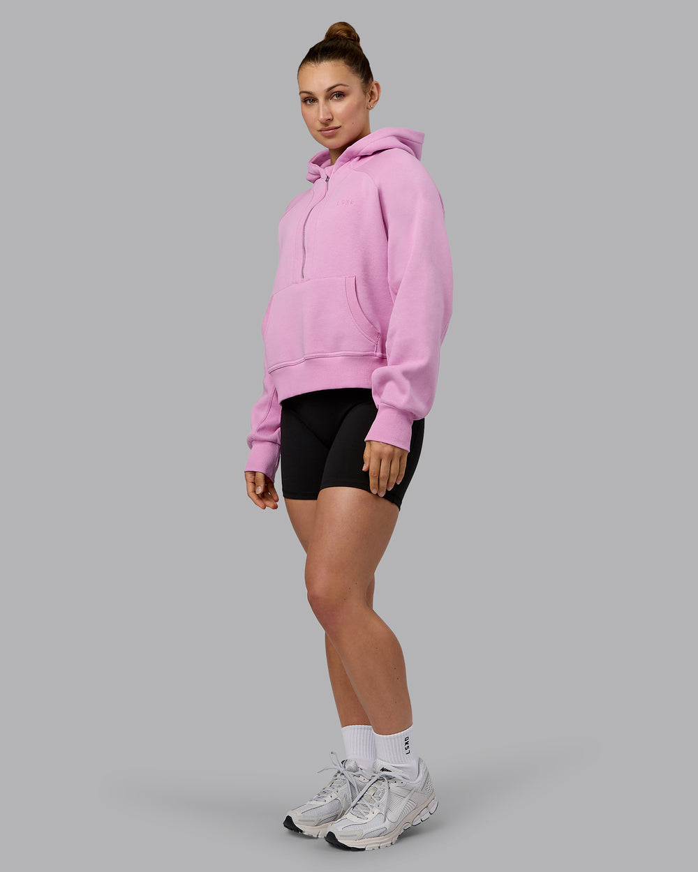 Woman wearing Pursue Hoodie - Pastel Orchid