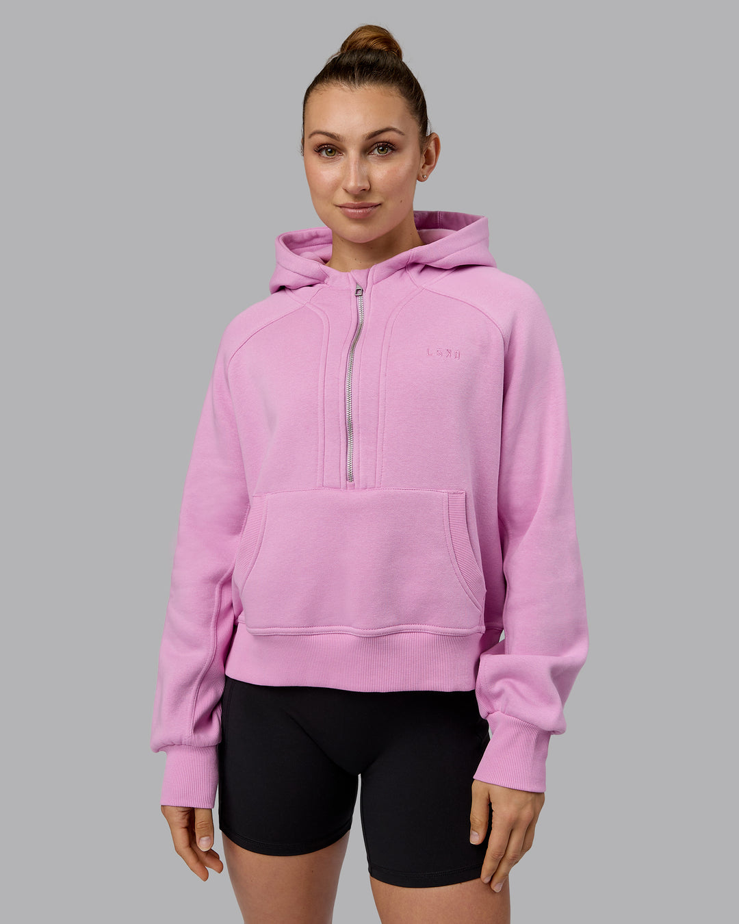 Woman wearing Pursue Hoodie - Pastel Orchid