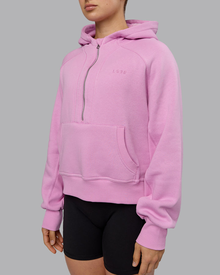 Woman wearing Pursue Hoodie - Pastel Orchid
