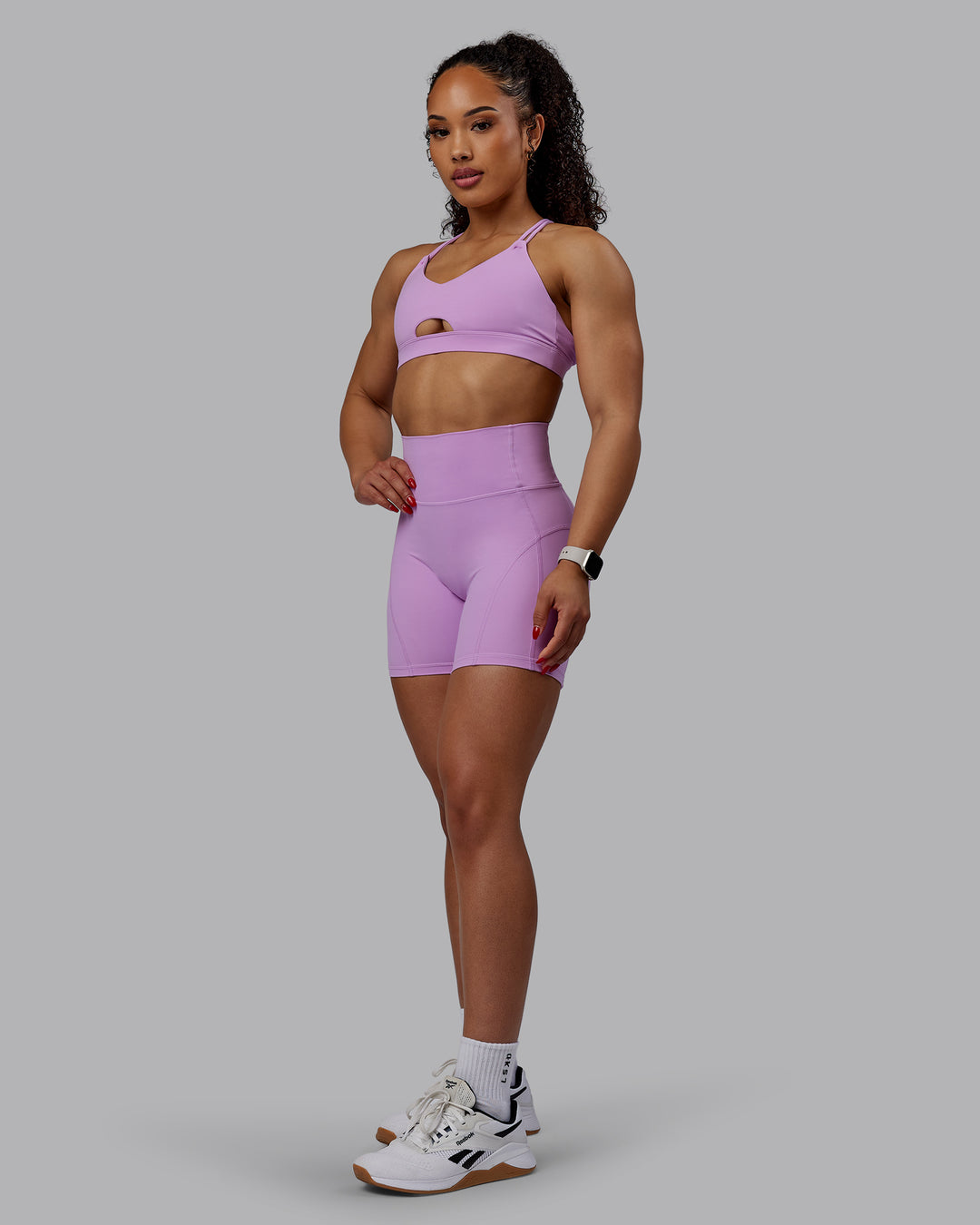 Woman wearing Pursue Sports Bra - Light Violet