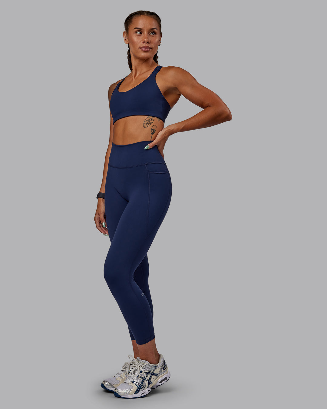 Woman wearing Push The Limit Sports Bra - Future Navy