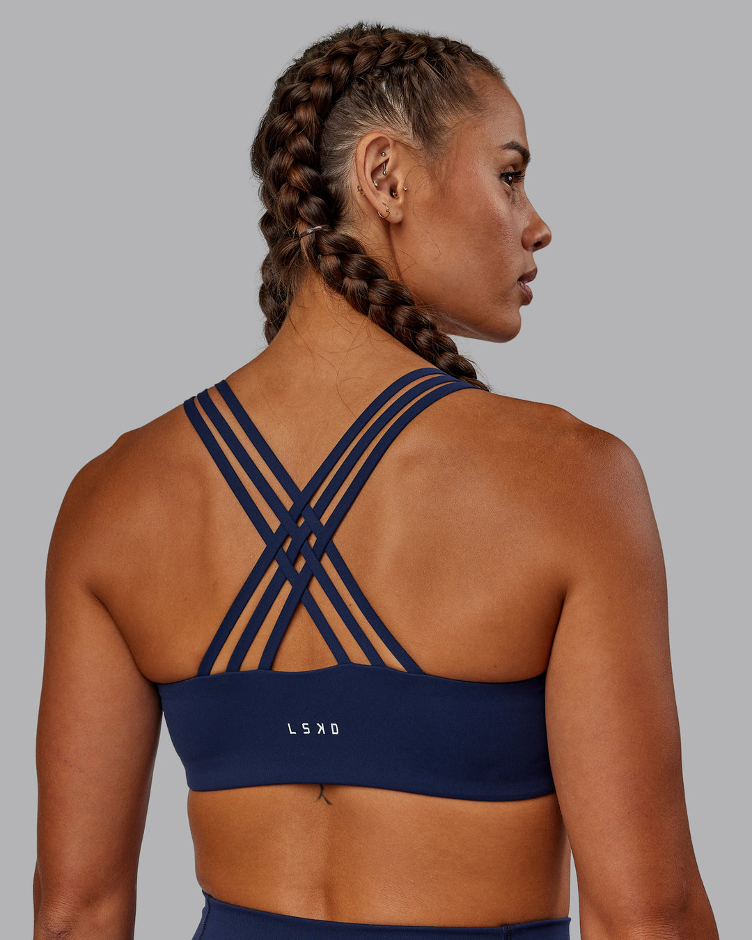 Woman wearing Push The Limit Sports Bra - Future Navy