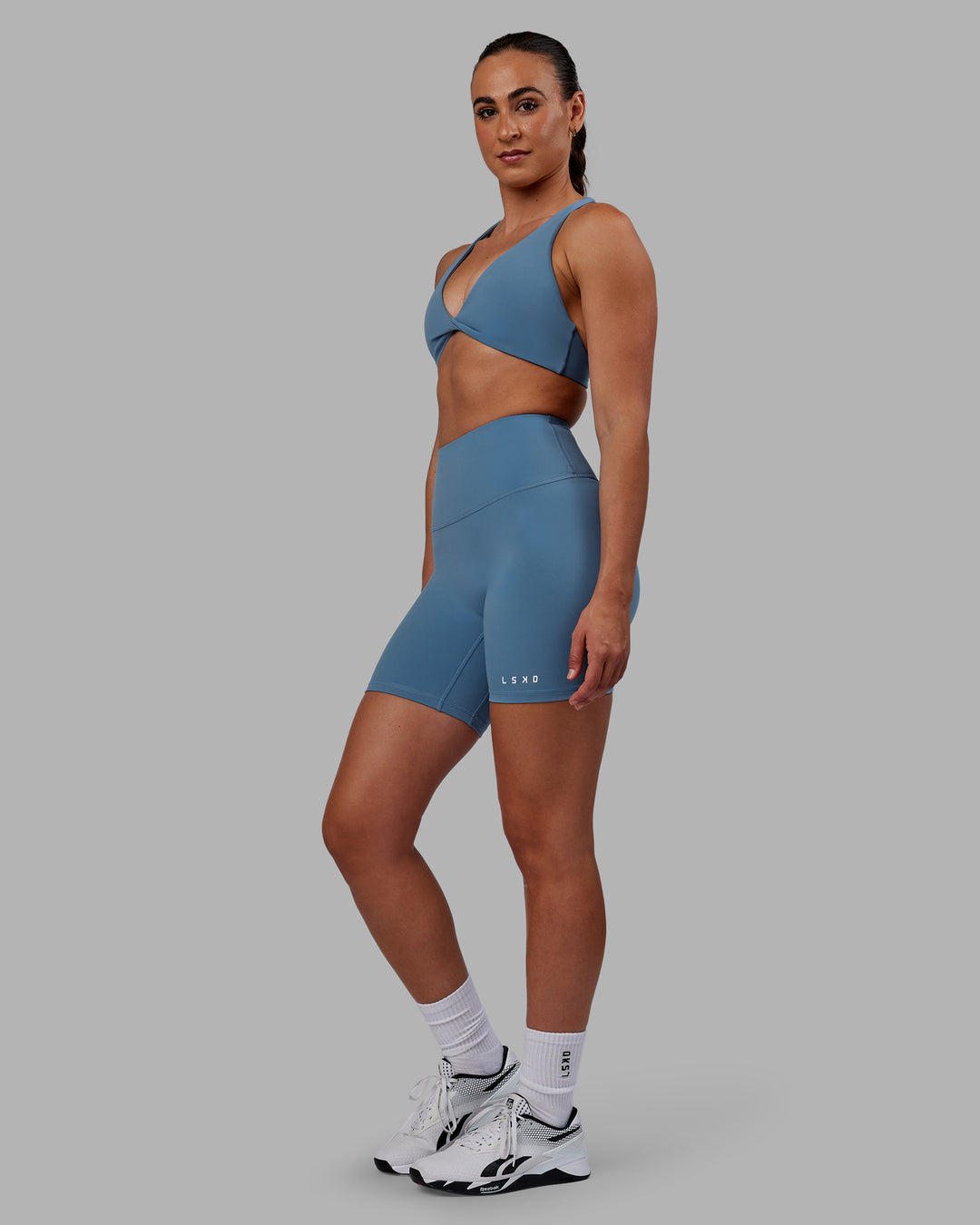 Woman wearing RXD High Waist Mid Short Tights - Elemental Blue