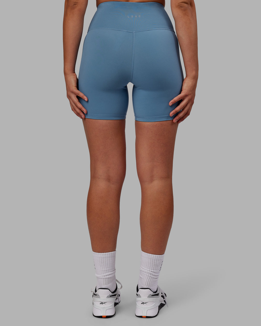 Woman wearing RXD High Waist Mid Short Tights - Elemental Blue