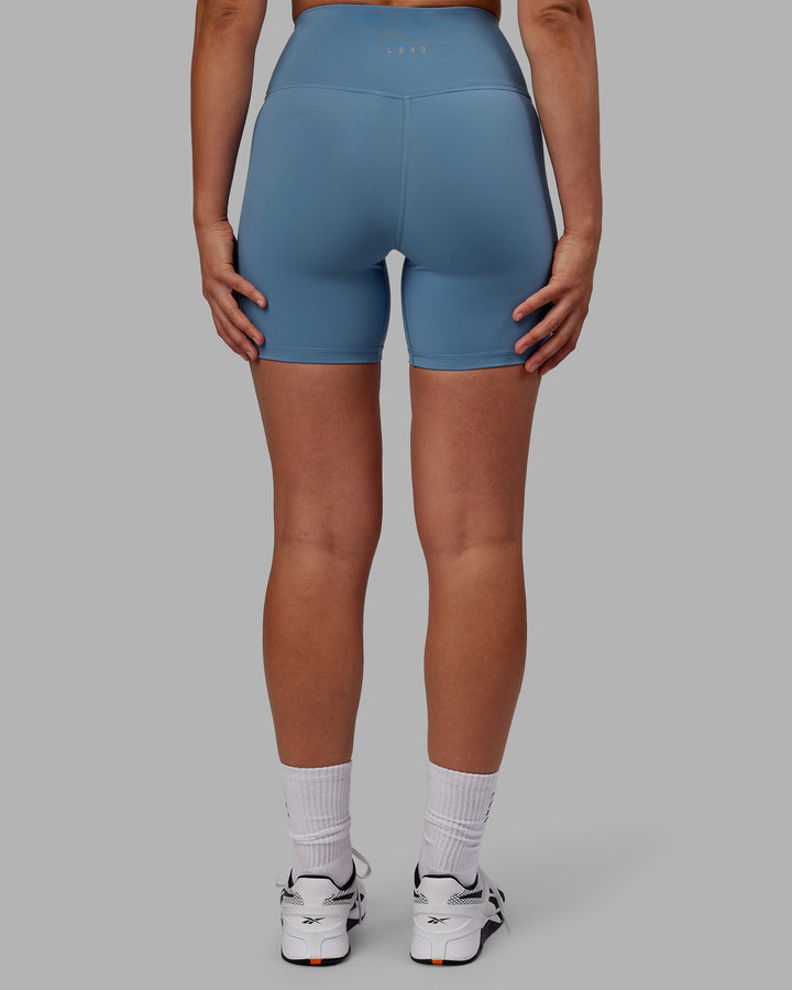 Woman wearing RXD High Waist Mid Short Tights - Elemental Blue
