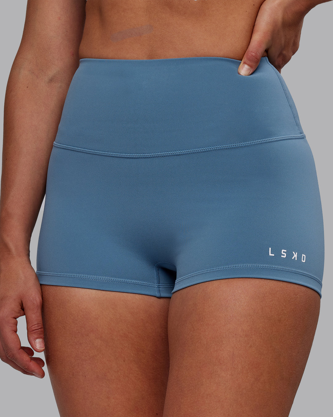 Woman wearing RXD High Waist Micro Short Tights - Elemental Blue