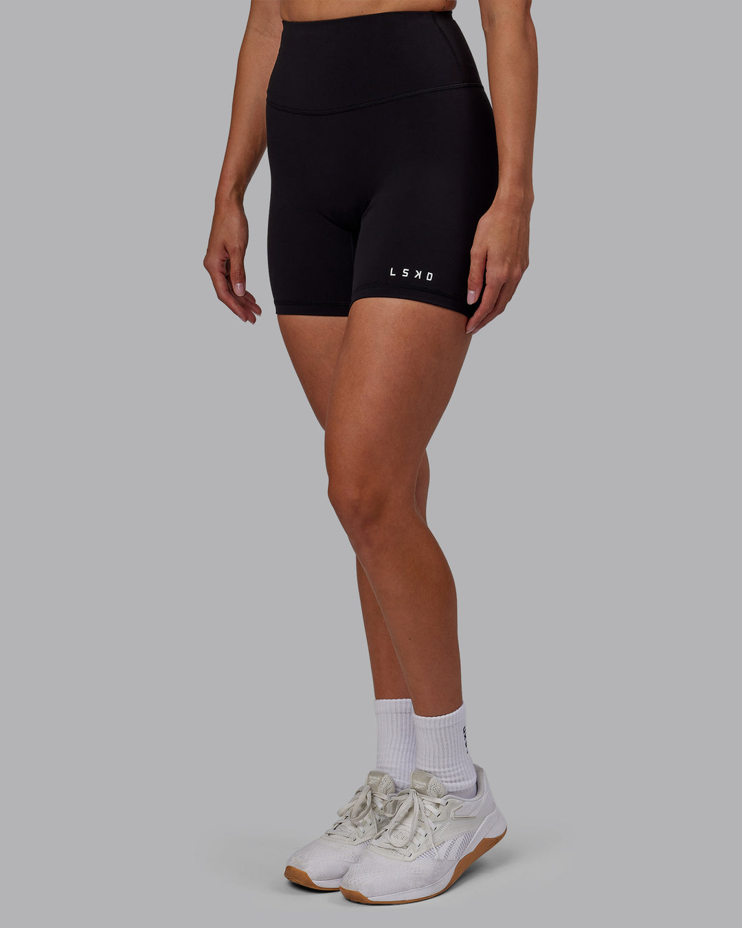 Woman wearing RXD High Waist Mid Short Tights - Black