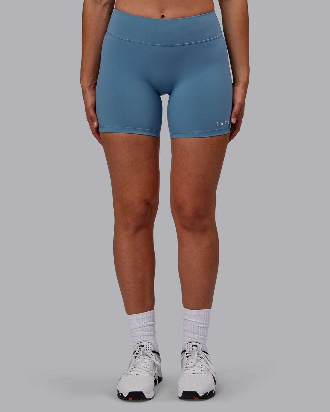 Woman wearing RXD Mid Short Tights - Elemental Blue