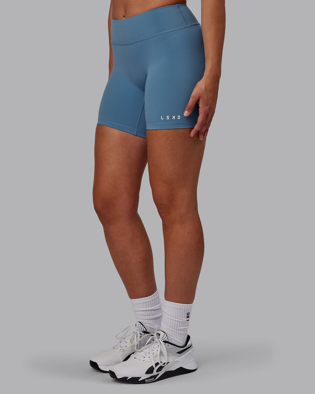 Woman wearing RXD Mid Short Tights - Elemental Blue