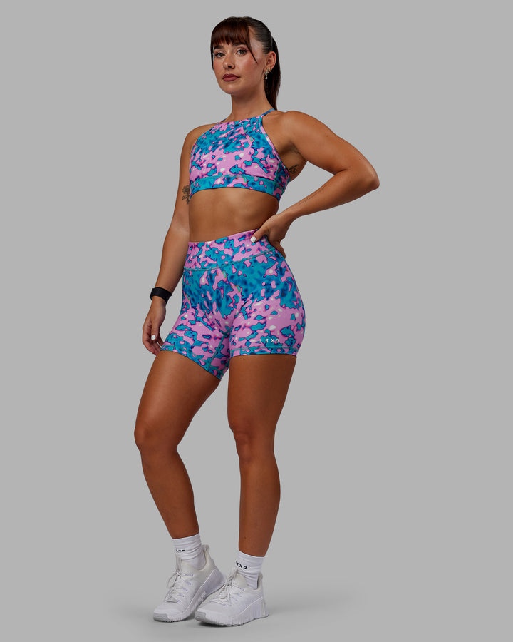 Woman wearing RXD Mid Short Tights - Neon Camo
