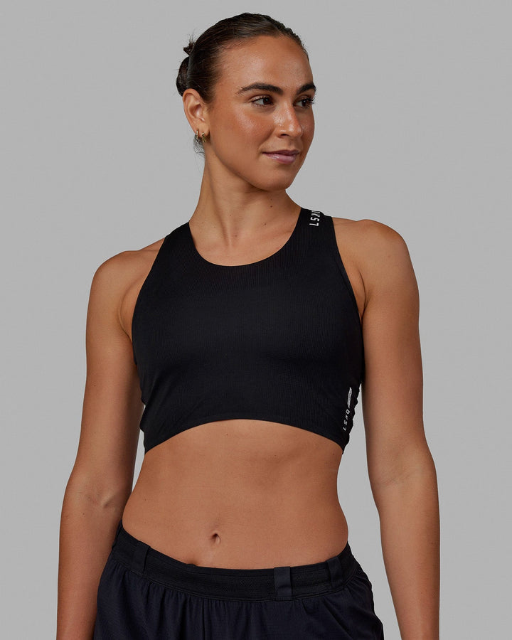 Woman wearing Race Day Cropped Performance Tank - Black-White
