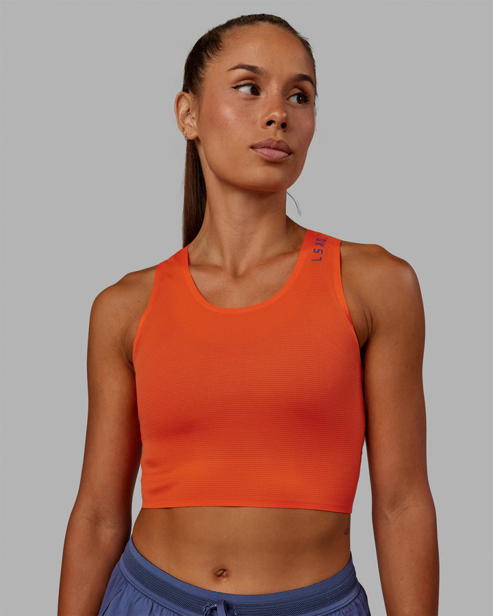 Woman wearing Race Day Cropped Performance Tank - Ultra Orange-Future Dusk
