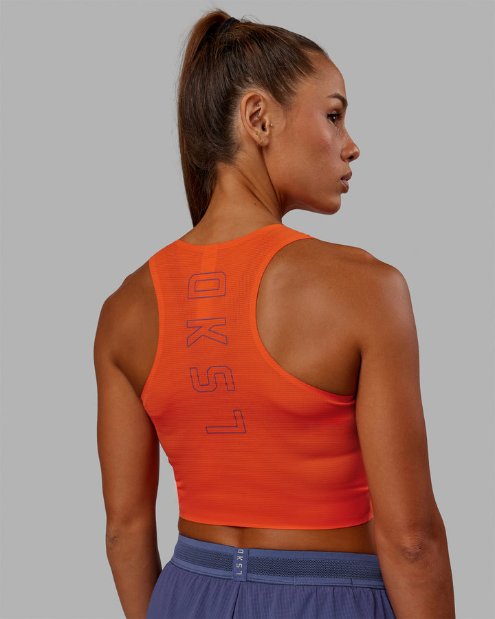 Woman wearing Race Day Cropped Performance Tank - Ultra Orange-Future Dusk
