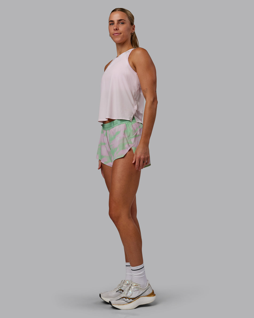 Woman wearing Race Day Performance Tank - Festival Bloom-White