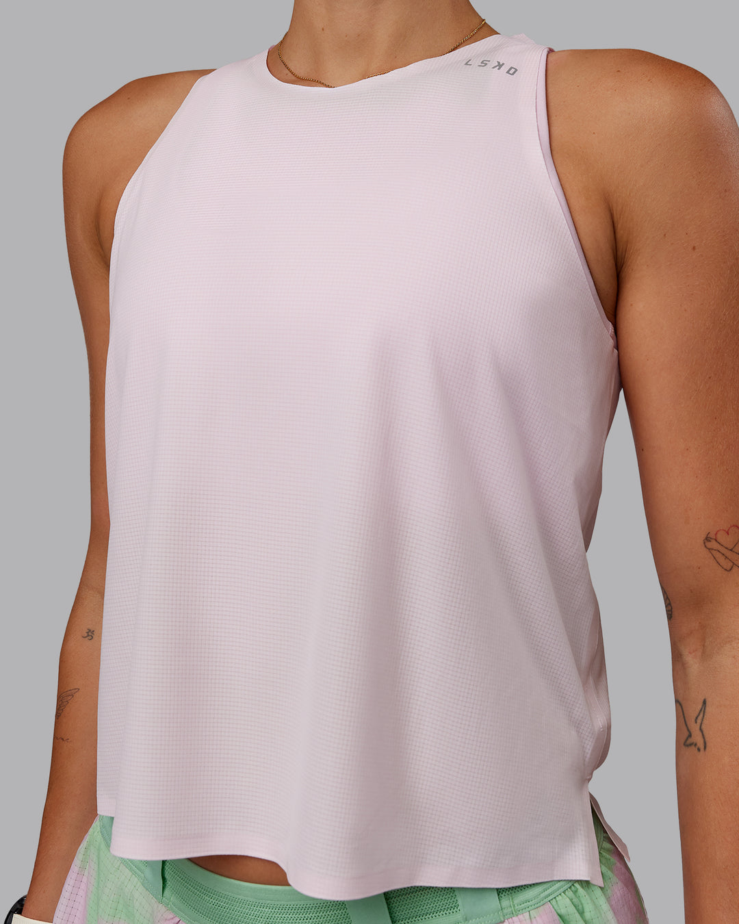 Woman wearing Race Day Performance Tank - Festival Bloom-White