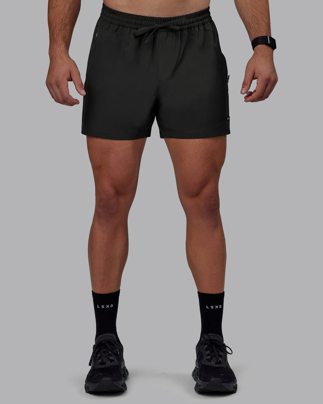 Man wearing Rep 5&quot; Lined Performance Shorts - Pirate Black