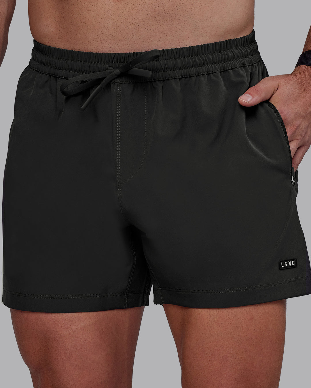 Man wearing Rep 5&quot; Lined Performance Shorts - Pirate Black