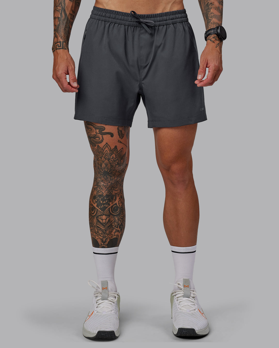 Man wearing Rep 5&quot; Lined Performance Shorts - Dark Storm