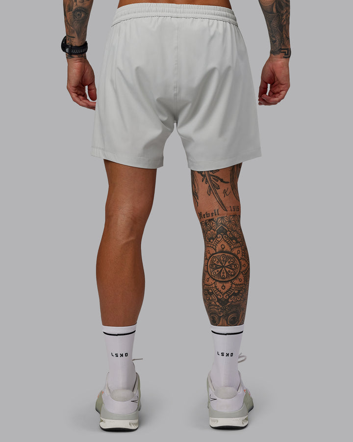 Man wearing Rep 5&quot; Lined Performance Shorts - Digital Mist
