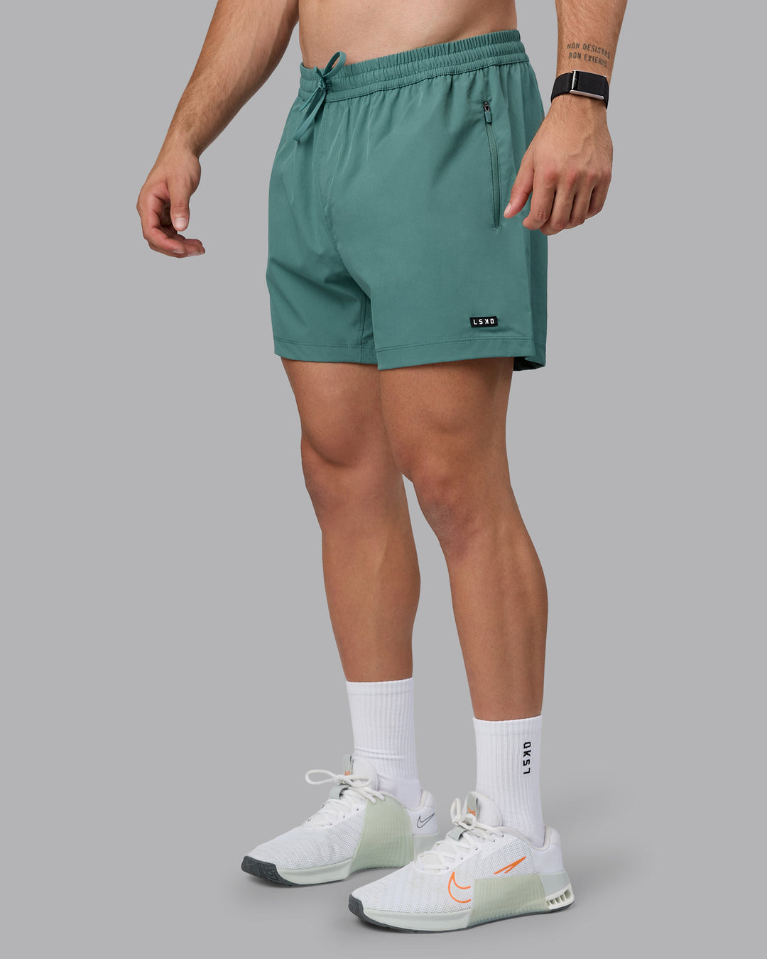 Man wearing Rep 5&quot; Lined Performance Shorts - Sagebrush