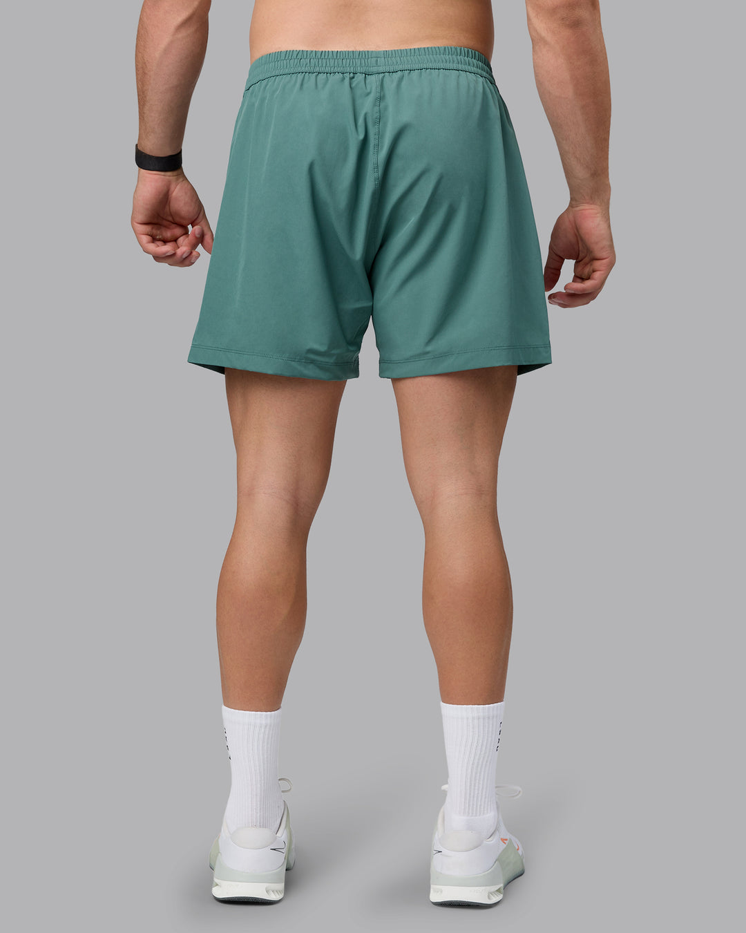 Man wearing Rep 5&quot; Lined Performance Shorts - Sagebrush