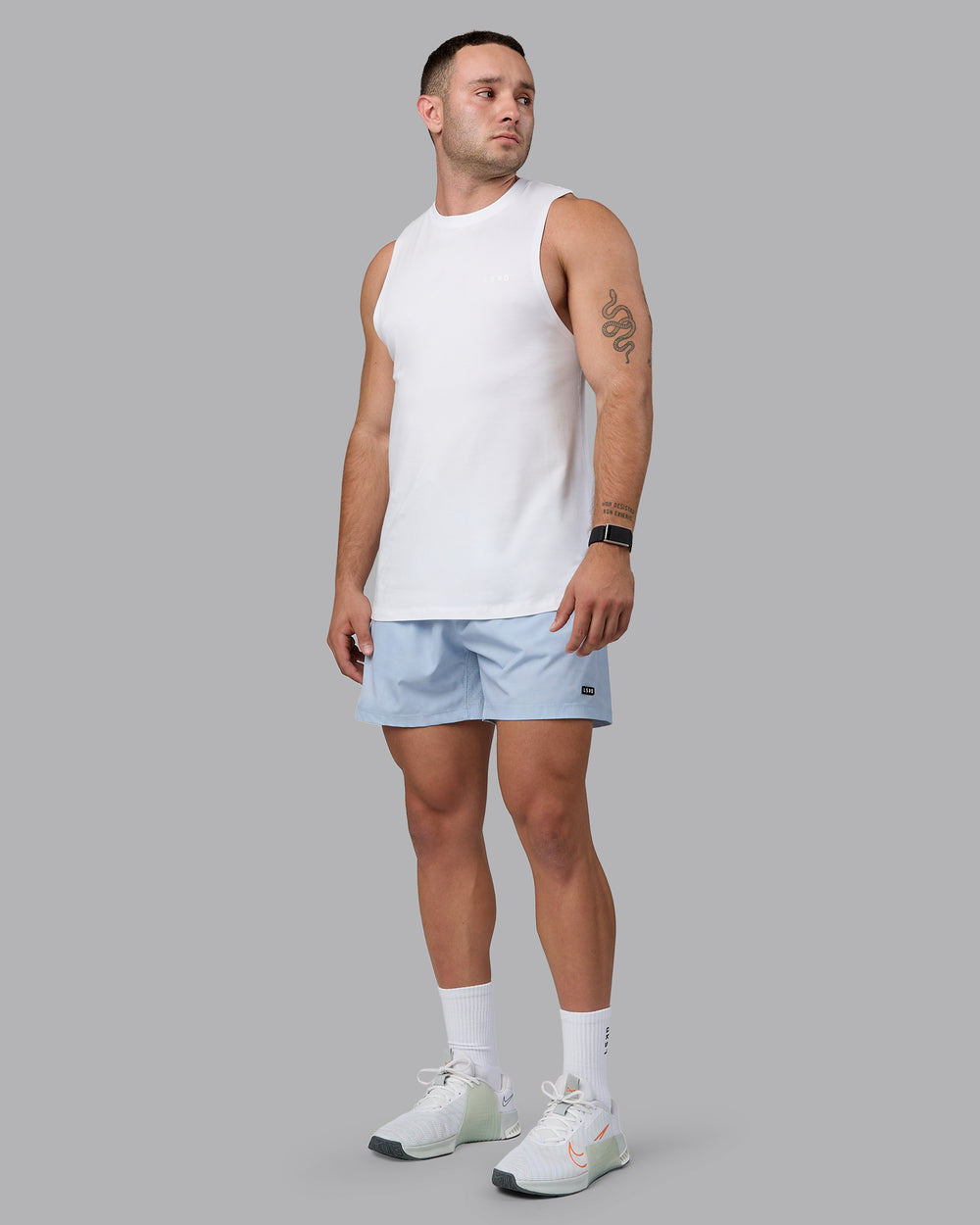 Man wearing Rep 5" Performance Shorts - Digital Camo Ice Blue