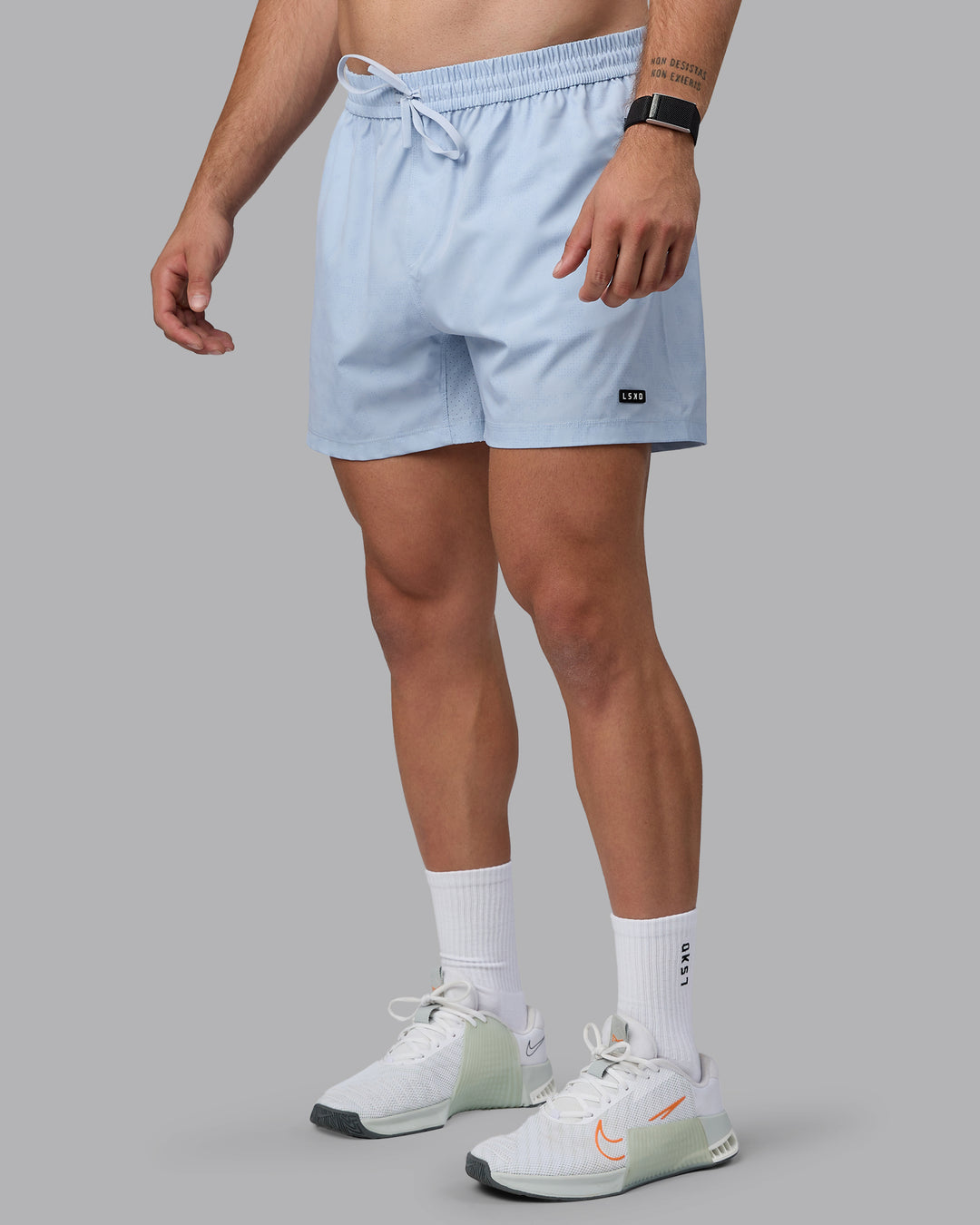 Man wearing Rep 5&quot; Performance Shorts - Digital Camo Ice Blue