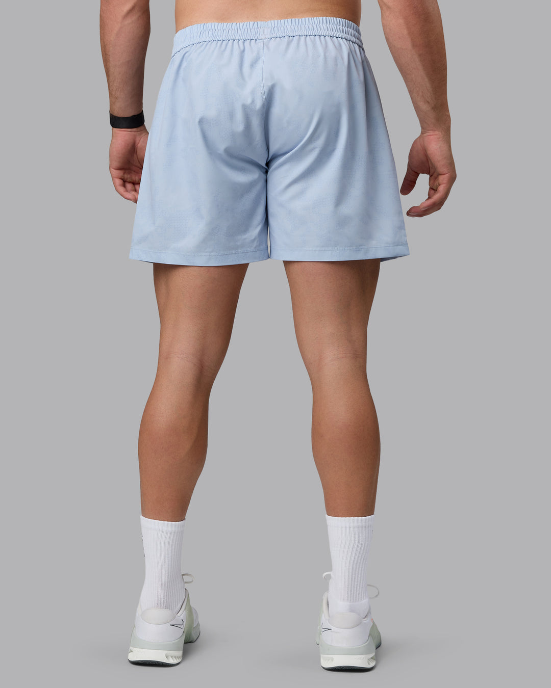 Man wearing Rep 5&quot; Performance Shorts - Digital Camo Ice Blue