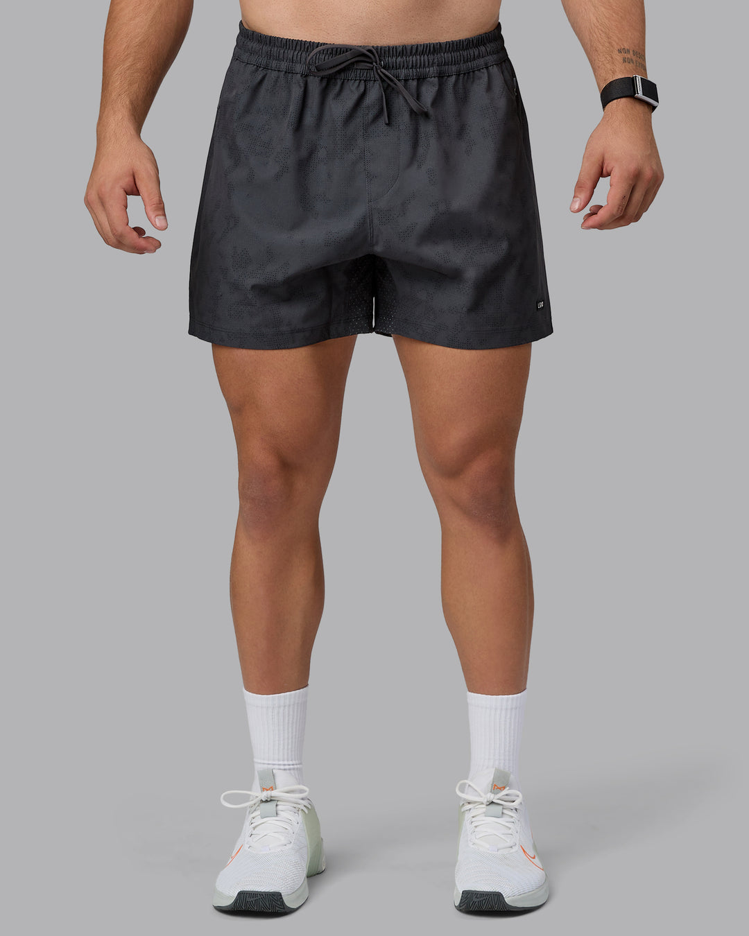 Man wearing Rep 5&quot; Performance Shorts - Digital Camo Pirate Black