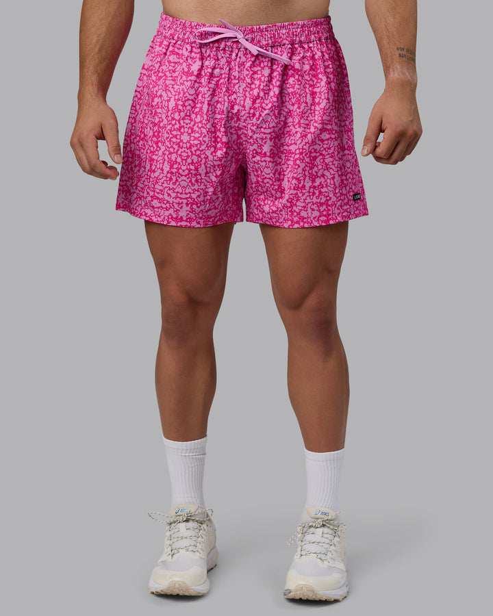 Man wearing Rep 5&quot; Performance Shorts - Patina Pastel Orchid
