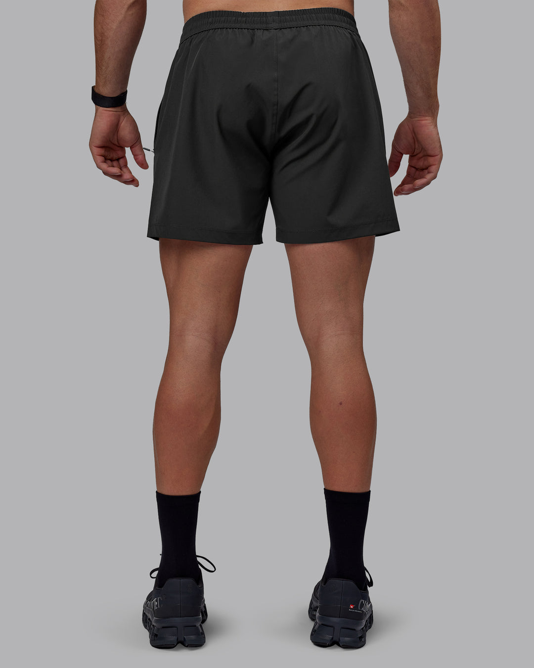 Man wearing Rep 5&quot; Performance Shorts - Pirate Black