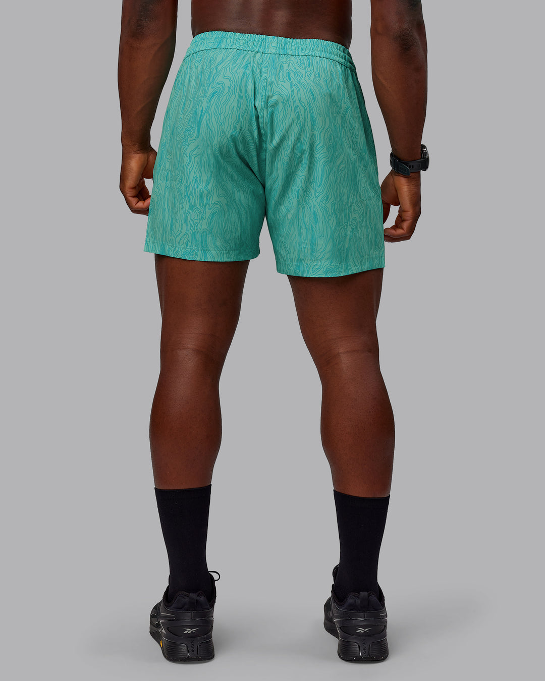 Man wearing Rep 5&quot; Performance Shorts - Topographic Blue Bird