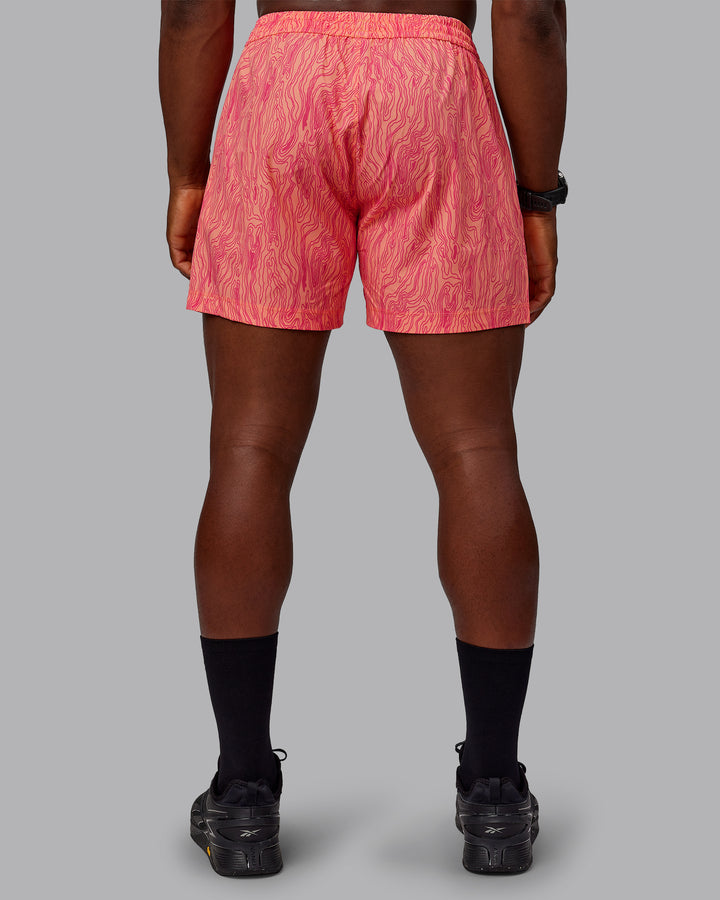 Man wearing Rep 5&quot; Performance Shorts - Topographic Peach
