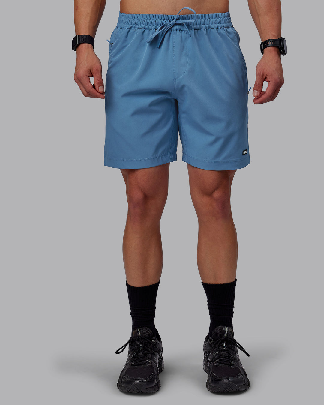 Man wearing Rep 7&quot; Performance Shorts - Elemental Blue