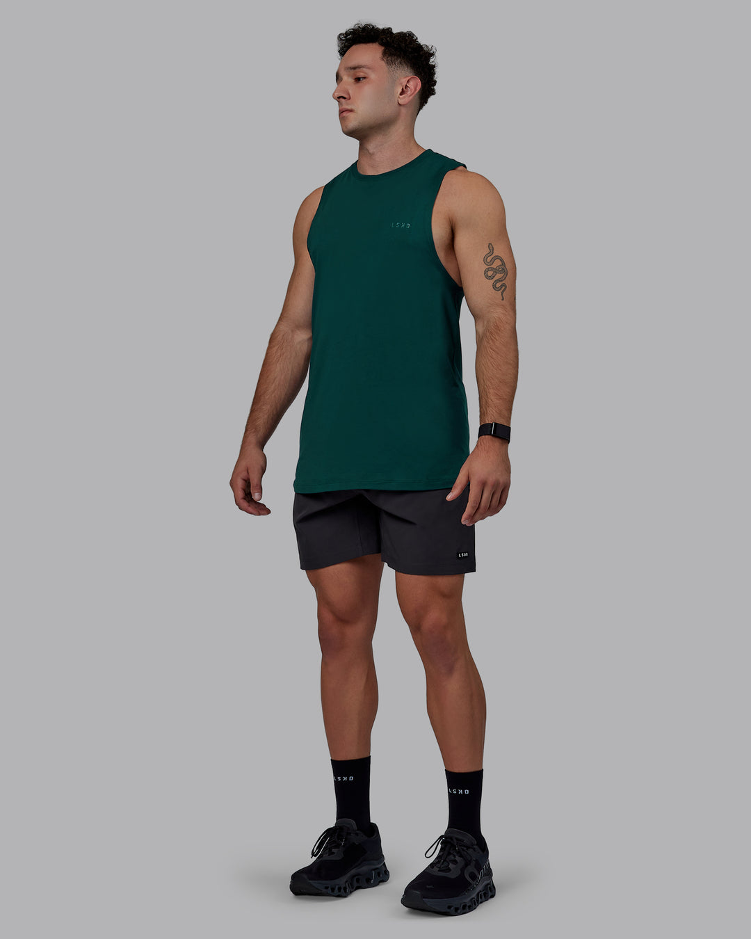 Man wearing Rep 7&quot; Performance Shorts - Pirate Black