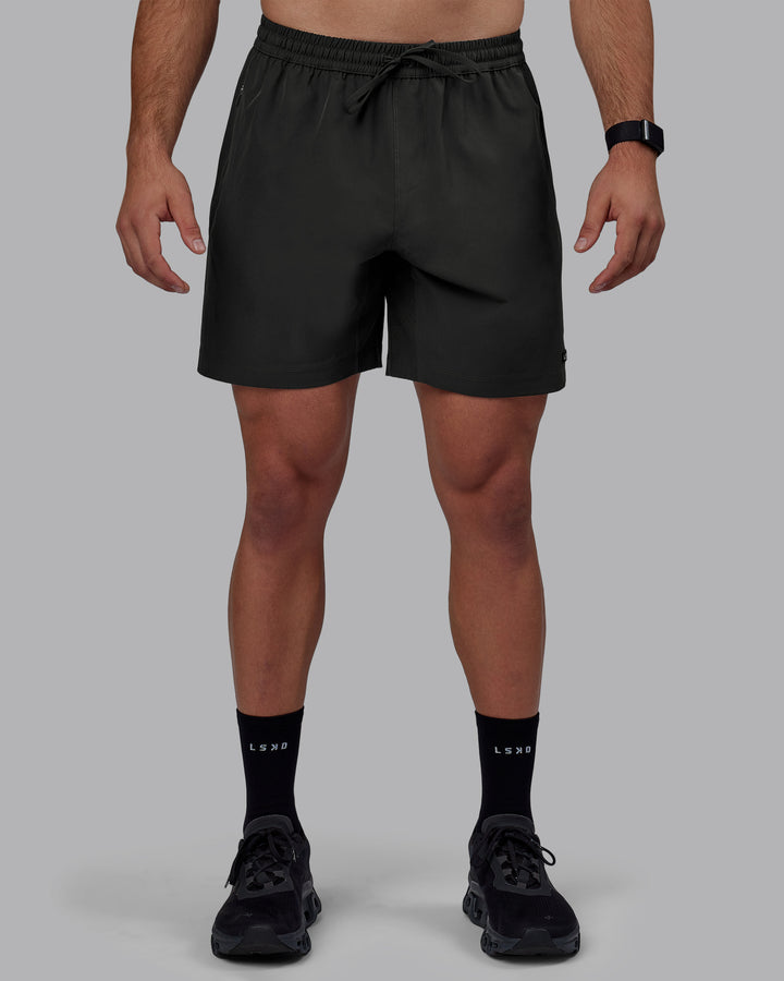 Man wearing Rep 7&quot; Performance Shorts - Pirate Black
