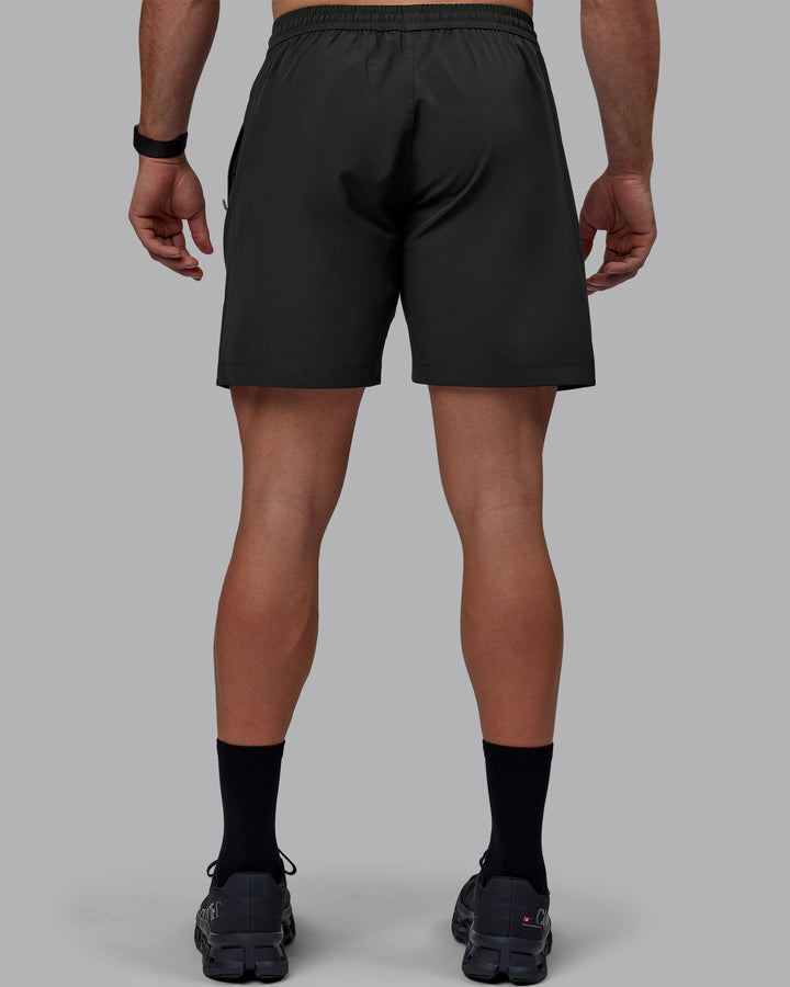 Man wearing Rep 7&quot; Performance Shorts - Pirate Black
