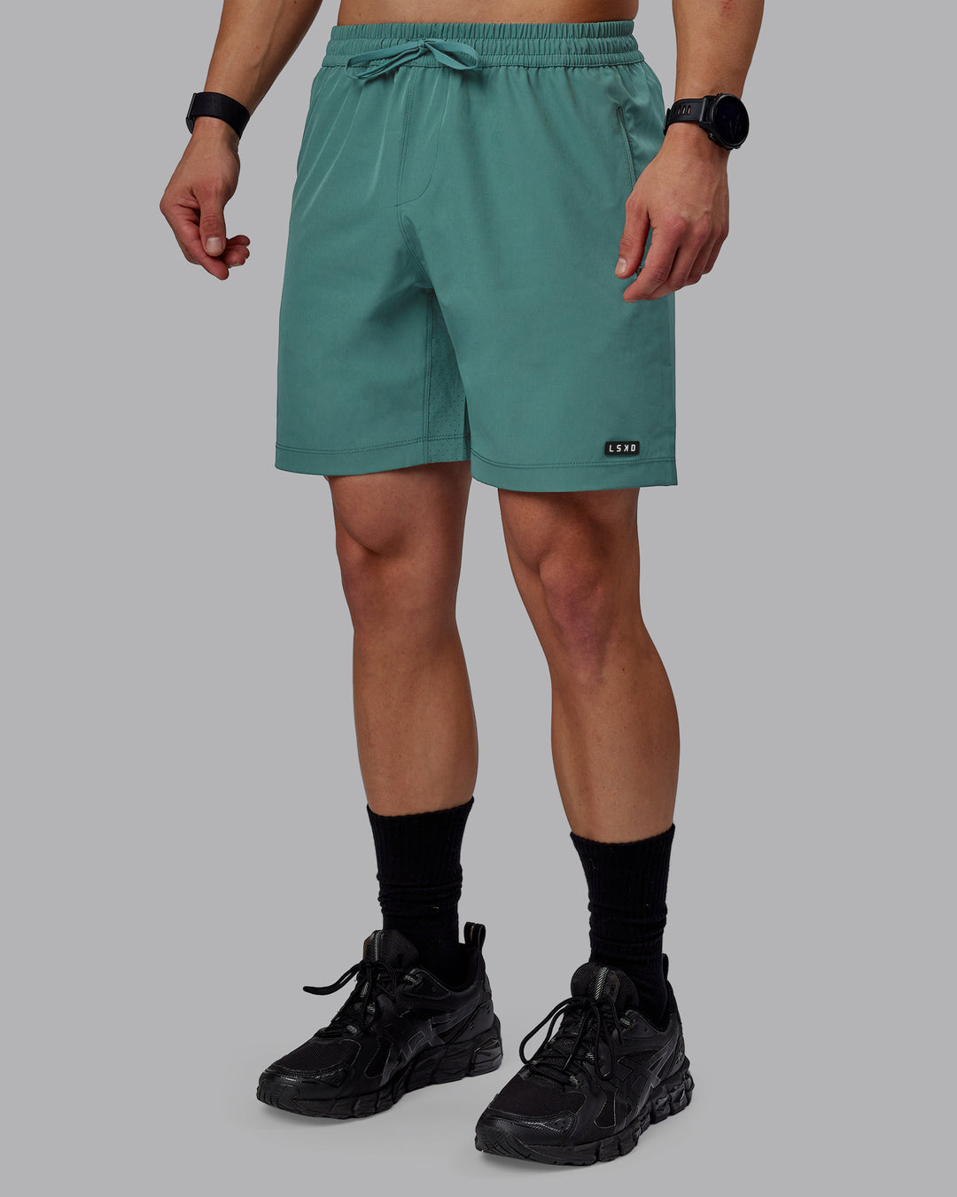 Man wearing Rep 7&quot; Performance Shorts - Sage Bush