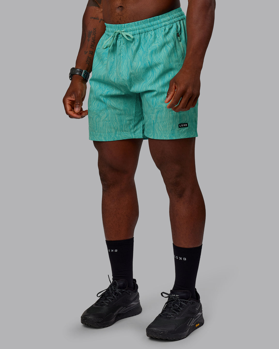 Man wearing Rep 7&quot; Performance Shorts - Topographic Blue Bird