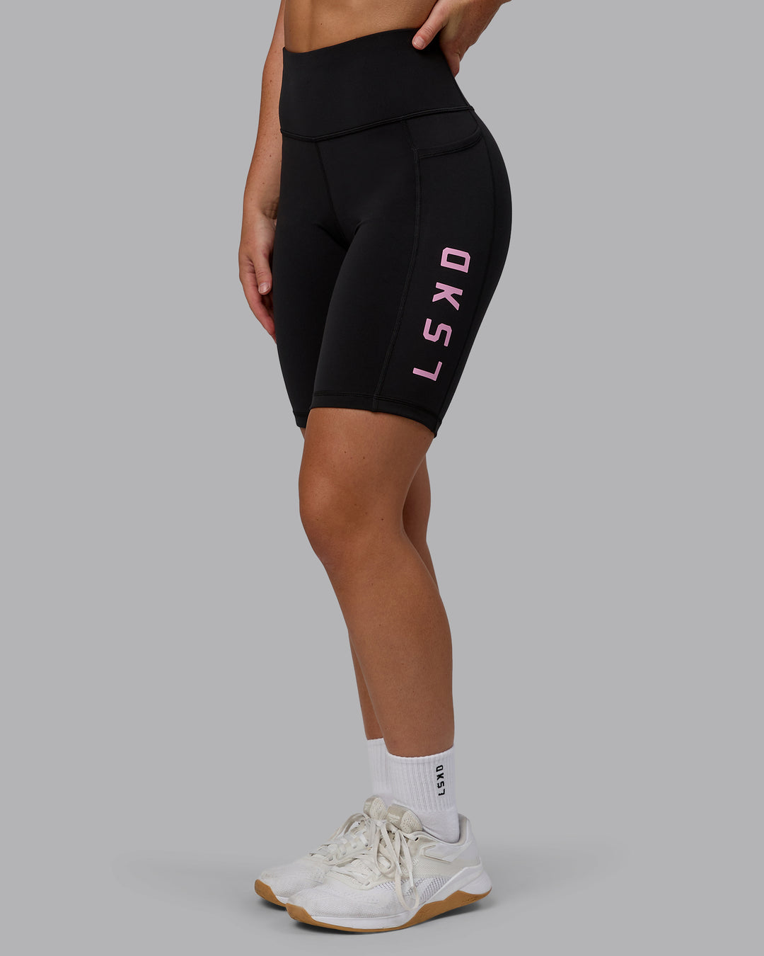 Woman wearing Rep Bike Shorts - Black-Bubblegum