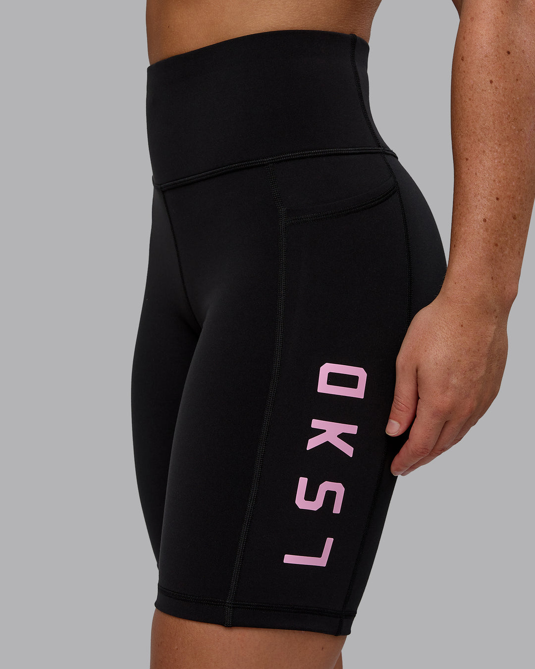 Woman wearing Rep Bike Shorts - Black-Bubblegum