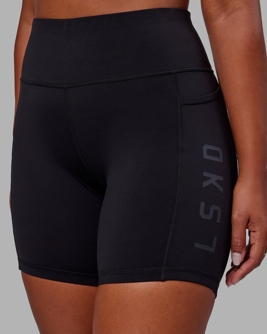 Woman wearing Rep Mid Short Tight - Black-Black